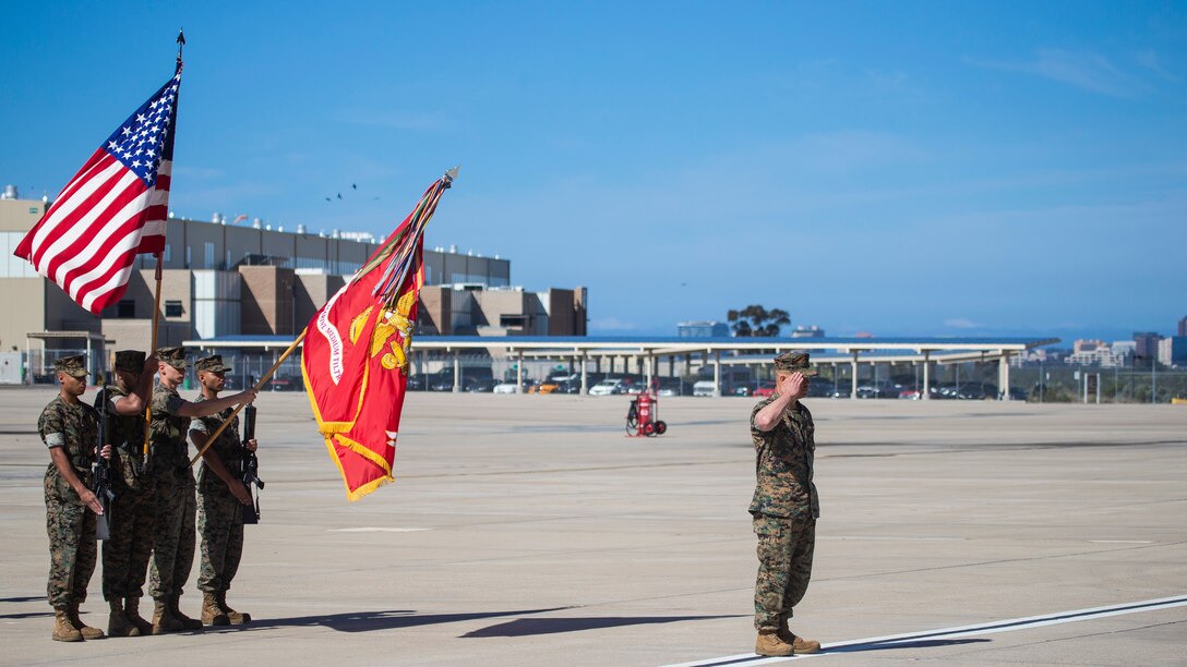 Marine Lt. Col. Charles E. Bodwell, outgoing commanding officer of Marine Medium Tiltrotor Squadron 166, Marine Aircraft Group 16, 3rd Marine Aircraft Wing, salutes during the playing of the national anthem during a change of command ceremony for Marine Medium Tiltrotor Squadron 166 at Marine Corps Air Station Miramar, Calif., March 28, 2019. The passing of the colors from Bodwell to Lt. Col. James C. Ford III signifies the transfer of responsibility, authority and accountability from the outgoing commanding officer to the incoming commanding officer. (U.S. Marine Corps photo by Cpl. Samuel Ruiz)