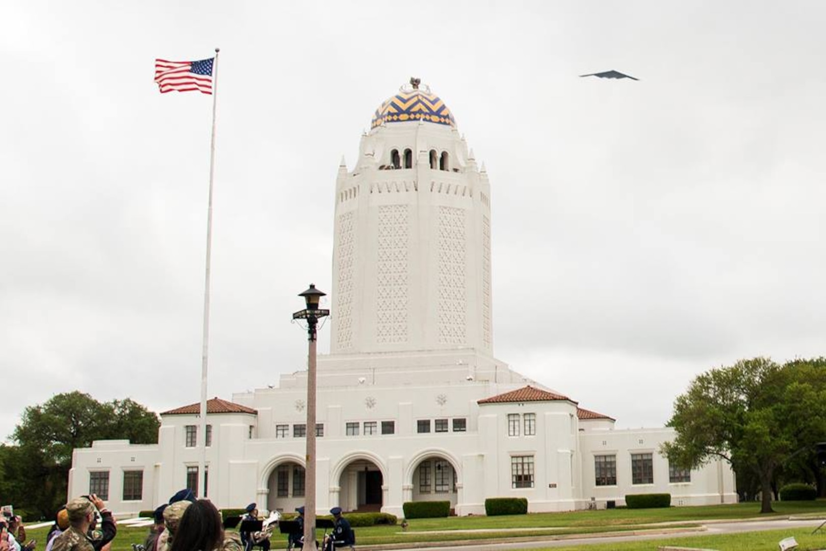 A B-2 from Whiteman Air Force Base, MO flies over during the Freedom Flyer Reunion wreath laying ceremony March 29, 2019, at Joint Base San Antonio-Randolph, Texas. The event honors all prisoners of war and missing in action service members from the Vietnam War and included a wreath-laying ceremony and a missing man formation flyover.