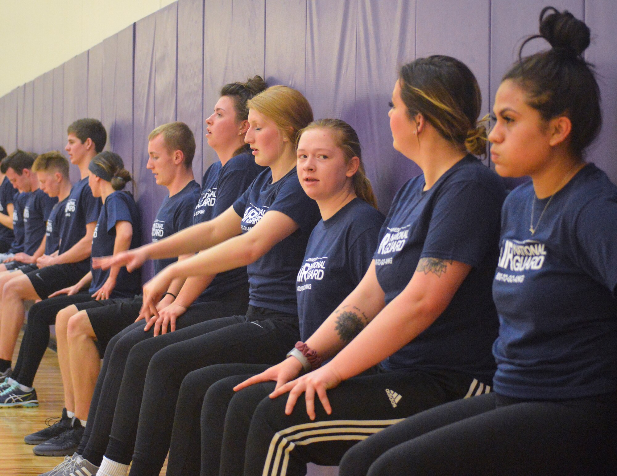 Members from the 133rd Airlift Wing’s Rookie Ranks program participate in a high-intensity intermittent training session and yoga in Minneapolis, Minn., March 23, 2019.
