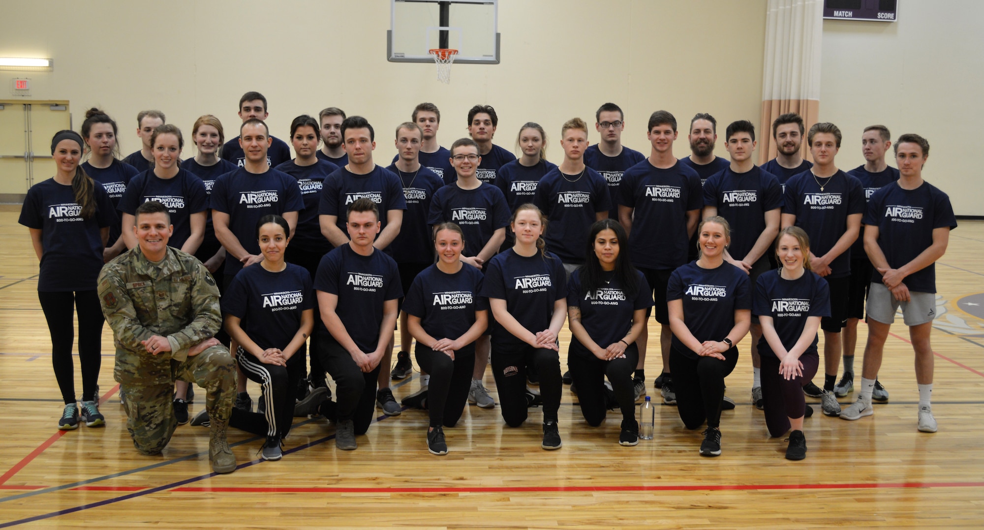 Members from the 133rd Airlift Wing’s Rookie Ranks program pose for a group photo in Minneapolis, Minn., March 23, 2019.