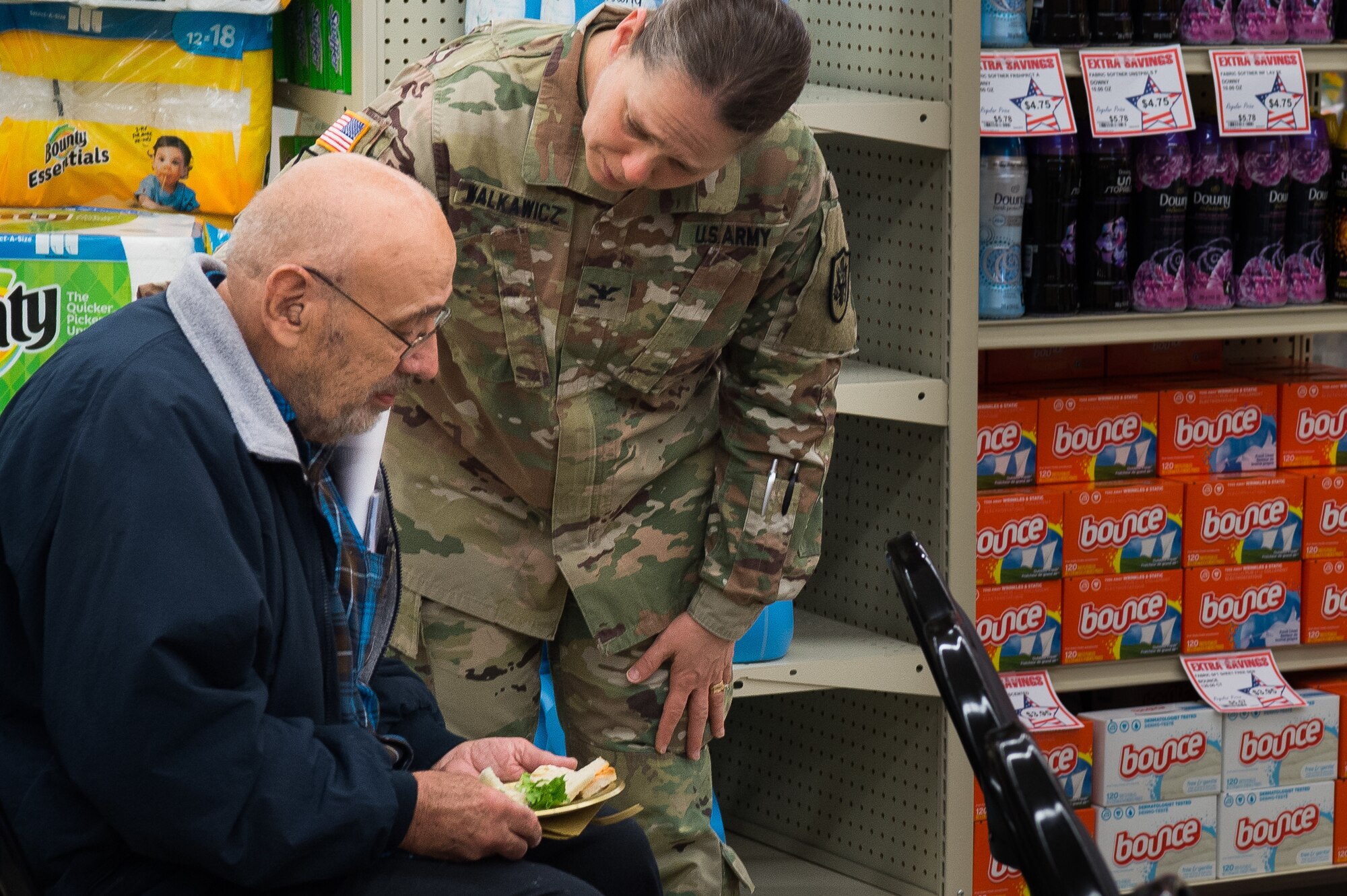 U.S. Army Col. Jennifer Walkawicz, 733rd Mission Support Group commander, consoles a U.S. Vietnam War Commemoration event attendee at Joint Base Langley-Eustis, Virginia, March 29, 2019.