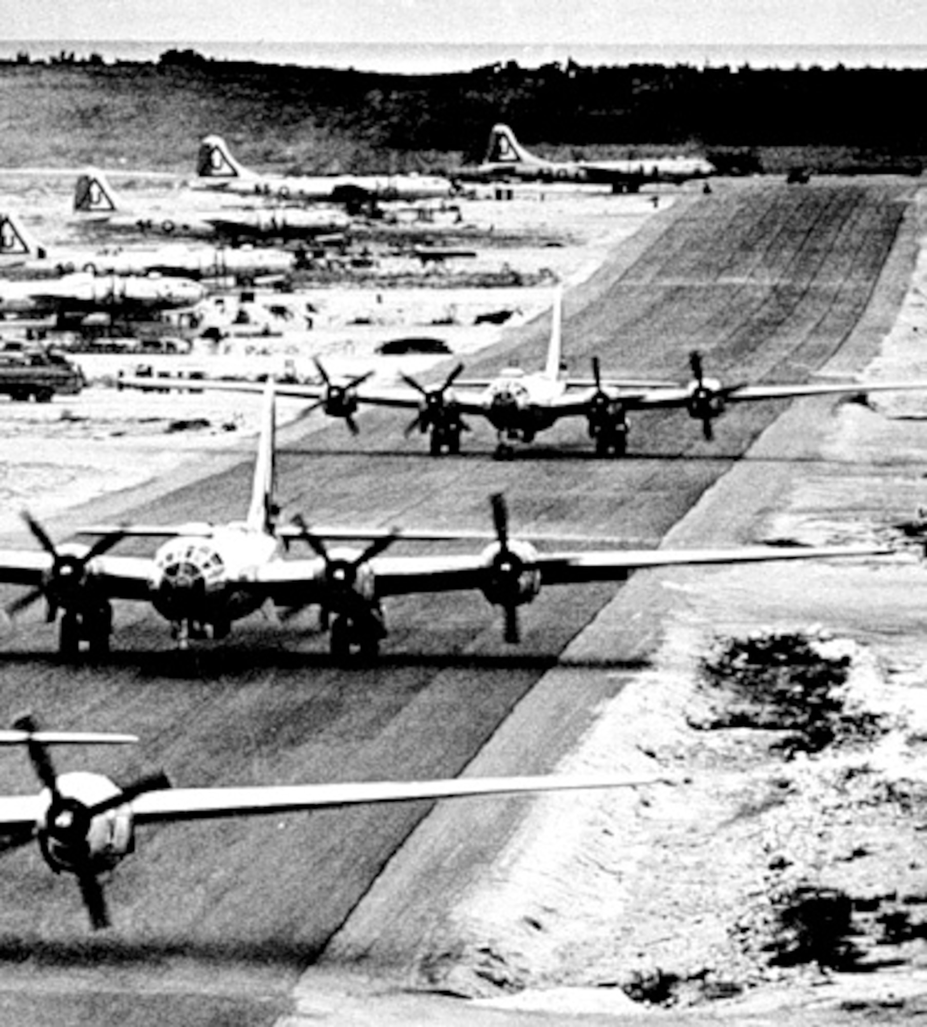 B-29s assigned to the Twentieth Air Force lined up on a Tinian runway. (Courtesy photo)