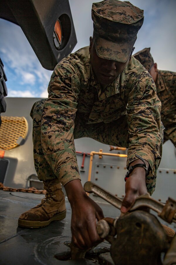 U.S. Marine Corps Pfc. Class Noe Quintanilla, an Embarkation Specialist with Marine Wing Headquarters Squadron 3, 3rd Marine Aircraft Wing, secures a Medium Tactical Vehicle Replacement onto Landing Craft Utility during maritime movement operations at Port Hueneme, Calif., as part of Exercise Pacific Blitz 19, March 12. PacBlitz19 is designed to train Marines and Sailors in maritime prepositioning force operations and aims to increase proficiency, expand levels of cooperation and to enhance maritime capabilities. (U.S. Marine Corps photo by Cpl. Jacob A. Farbo)