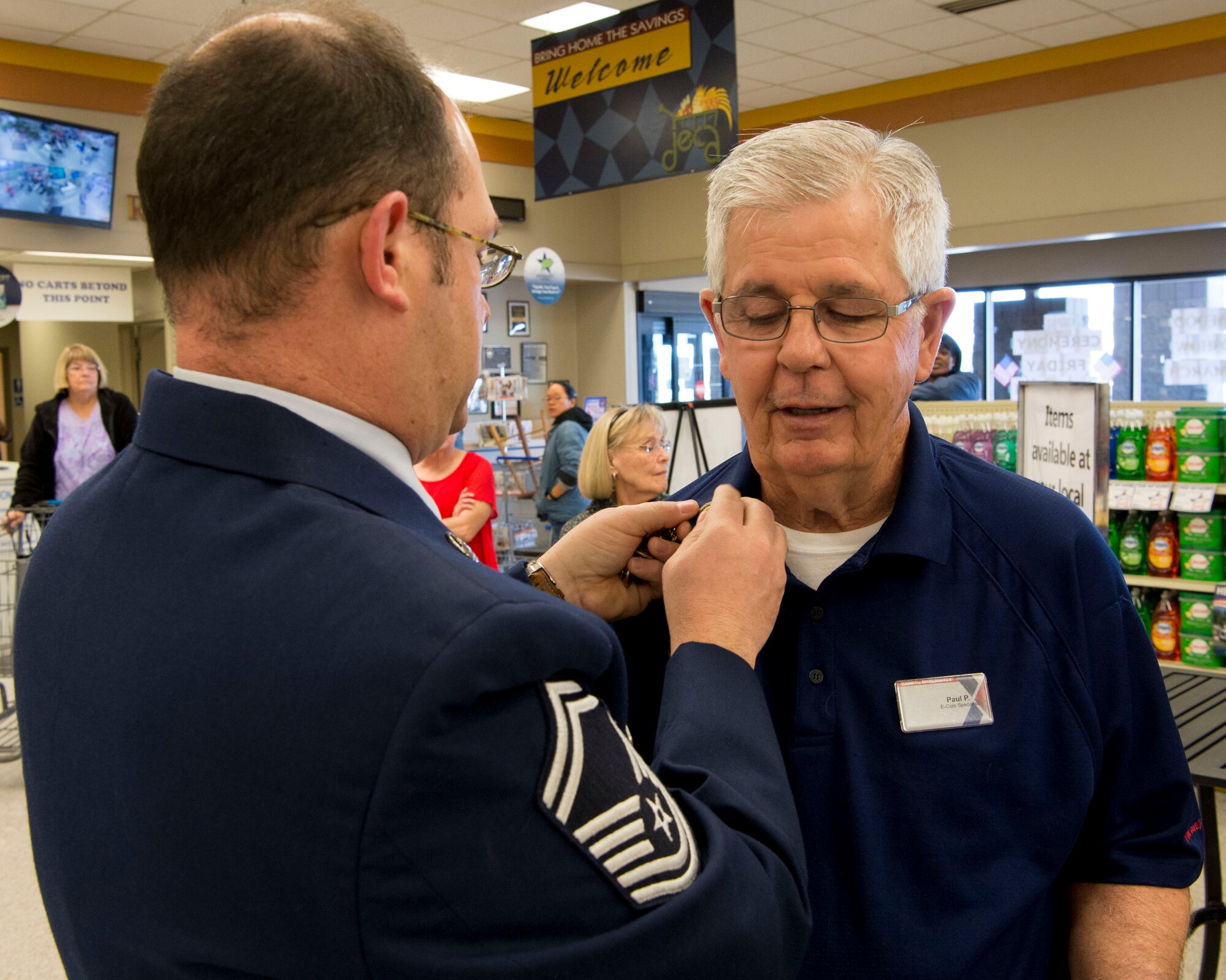 Vietnam veterans pose for a group photo at the March Air Reserve Base Commissary Calif., March 29, 2019, during the annual Vietnam War Veterans Day Ceremony. This ceremony is held to commemorate National Vietnam War Veterans Day. (U.S. Air 
Force photo by Staff Sgt. Bethany La Ville)