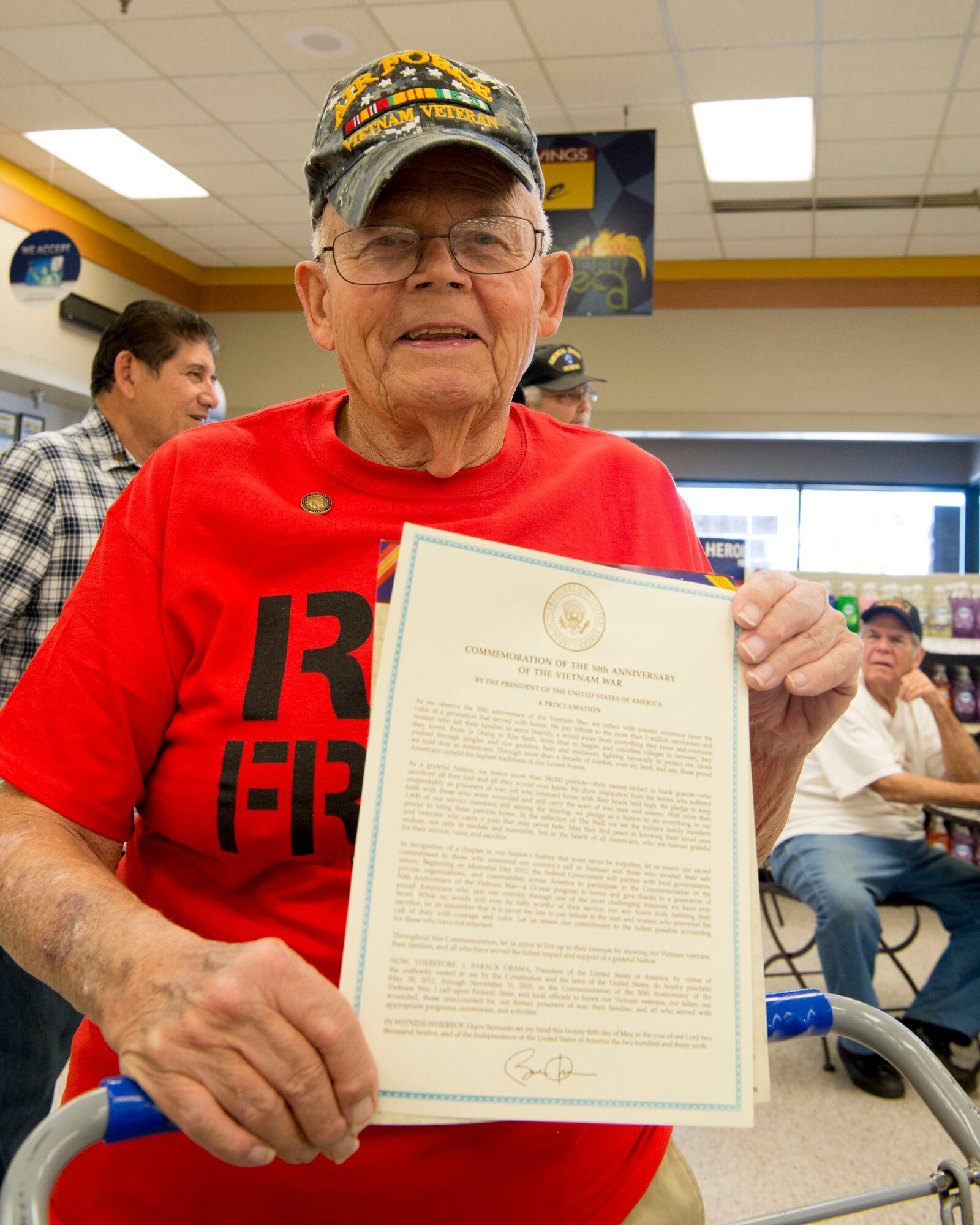 Vietnam veterans pose for a group photo at the March Air Reserve Base Commissary Calif., March 29, 2019, during the annual Vietnam War Veterans Day Ceremony. This ceremony is held to commemorate National Vietnam War Veterans Day. (U.S. Air 
Force photo by Staff Sgt. Bethany La Ville)