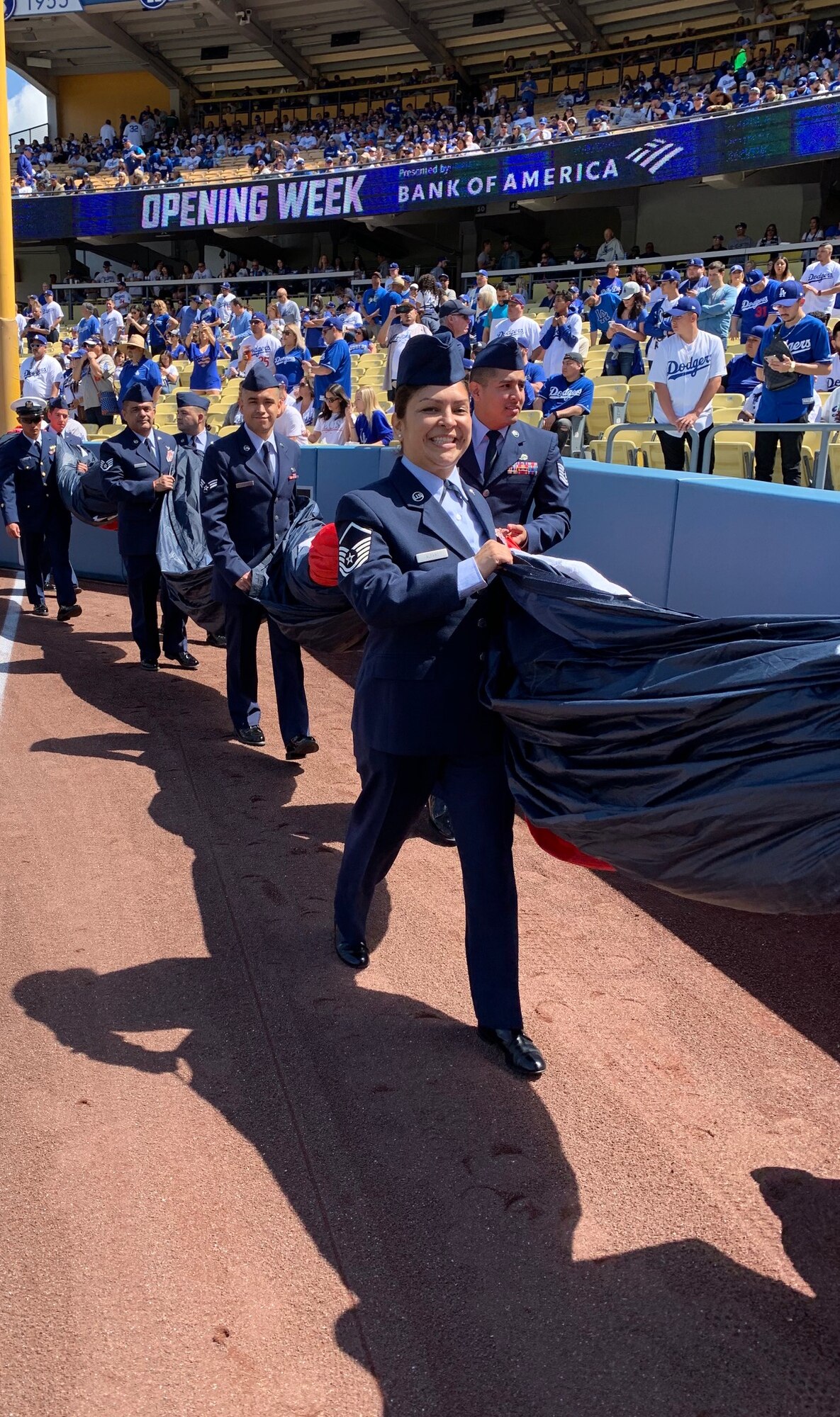 LOS ANGELES, Calif. - - Members of March Air Reserve Base, along with members of other service branches, participated in the opening day ceremony for the Los Angeles Dodgers Major League Baseball team on March 28.