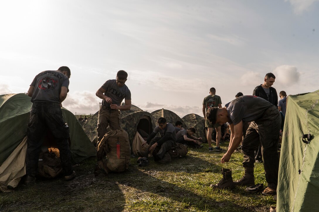 U.S. Marine Corps Officer candidates and applicants with Officer Selection Office Berkeley prepare for their next period of instruction during a Mini Officer Candidate School at U.S. Army Reserve Camp Parks in Dublin, Calif., March 23, 2019. Mini OCS is designed to give candidates and applicants an idea of what to expect at Marine Corps Officer Candidate School. (U.S. Marine Corps photo by Sgt. Christian Cachola)