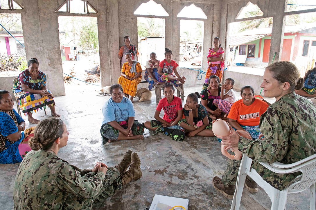 Lieutenant Commander Erika Schilling, left, and Lieutenant (junior grade) Natalie Spritzer teach Helping Babies Breathe class to local Chuukese women and girls during largest annual multinational humanitarian assistance and disaster relief preparedness mission conducted in Indo-Pacific, Pacific
Partnership 2019, in Chuuk, Federated States of Micronesia, March 31, 2019 (U.S. Navy/Tyrell K. Morris)