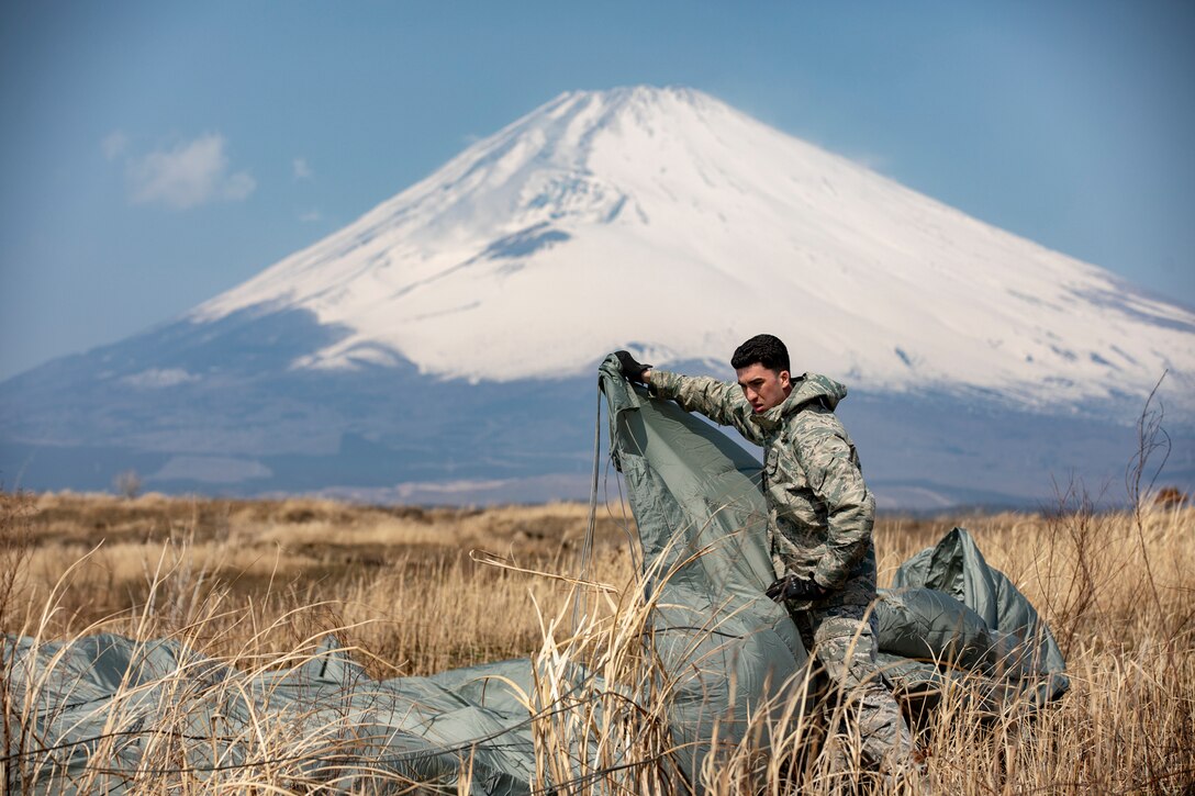 fold the canopy and suspension lines