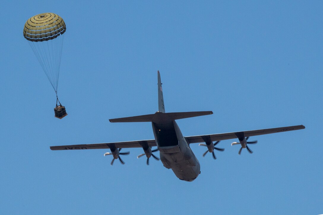 A parachute opens as a bundle