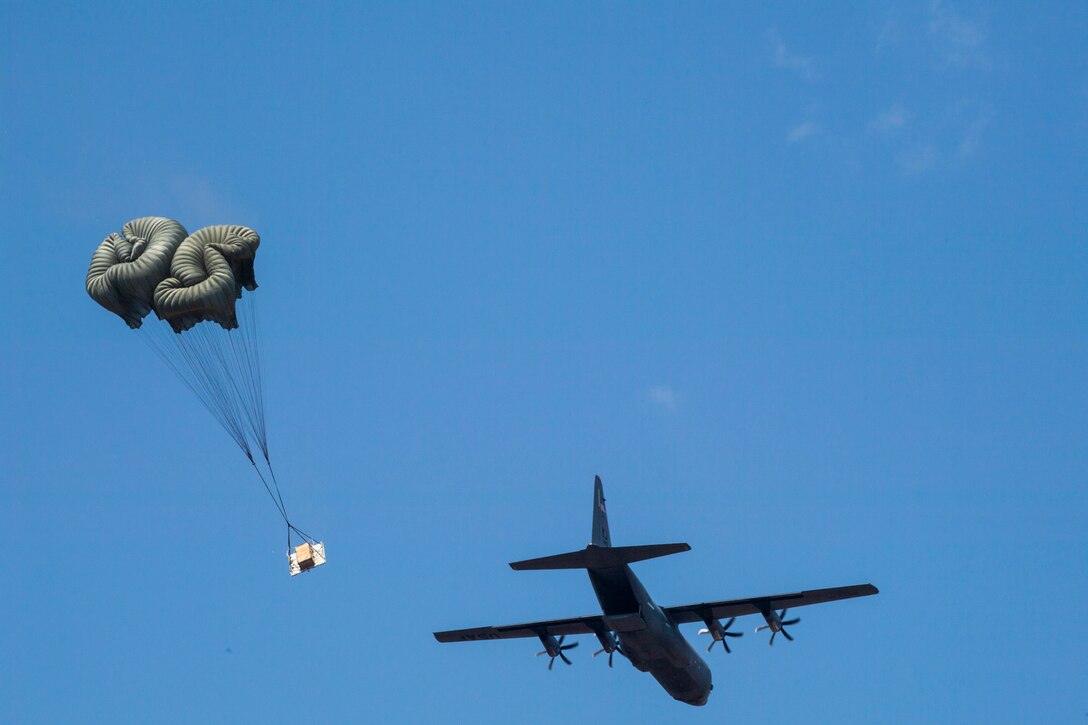 Parachutes open as a bundle