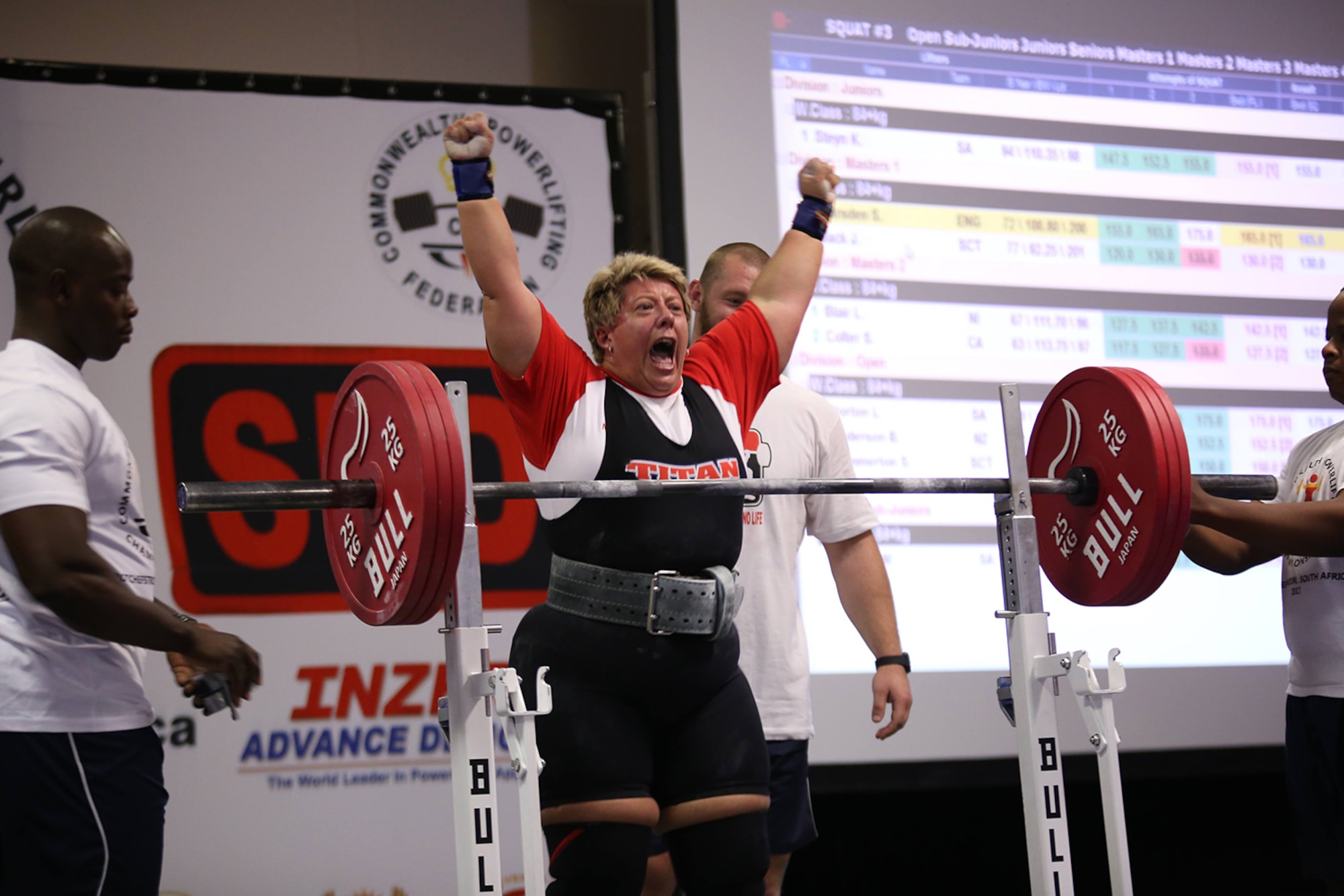 Sarah Marsden, 100th Civil Engineer Squadron environmental engineer, jumps for joy after she earned the British squat lift record for her category at the Commonwealth Powerlifting Championships in Potchefstroom, South Africa, in September 2017. Marsden won gold medals in squat, bench and deadlift categories during the competition. (Courtesy photo by Grant Hendry-Horne)
