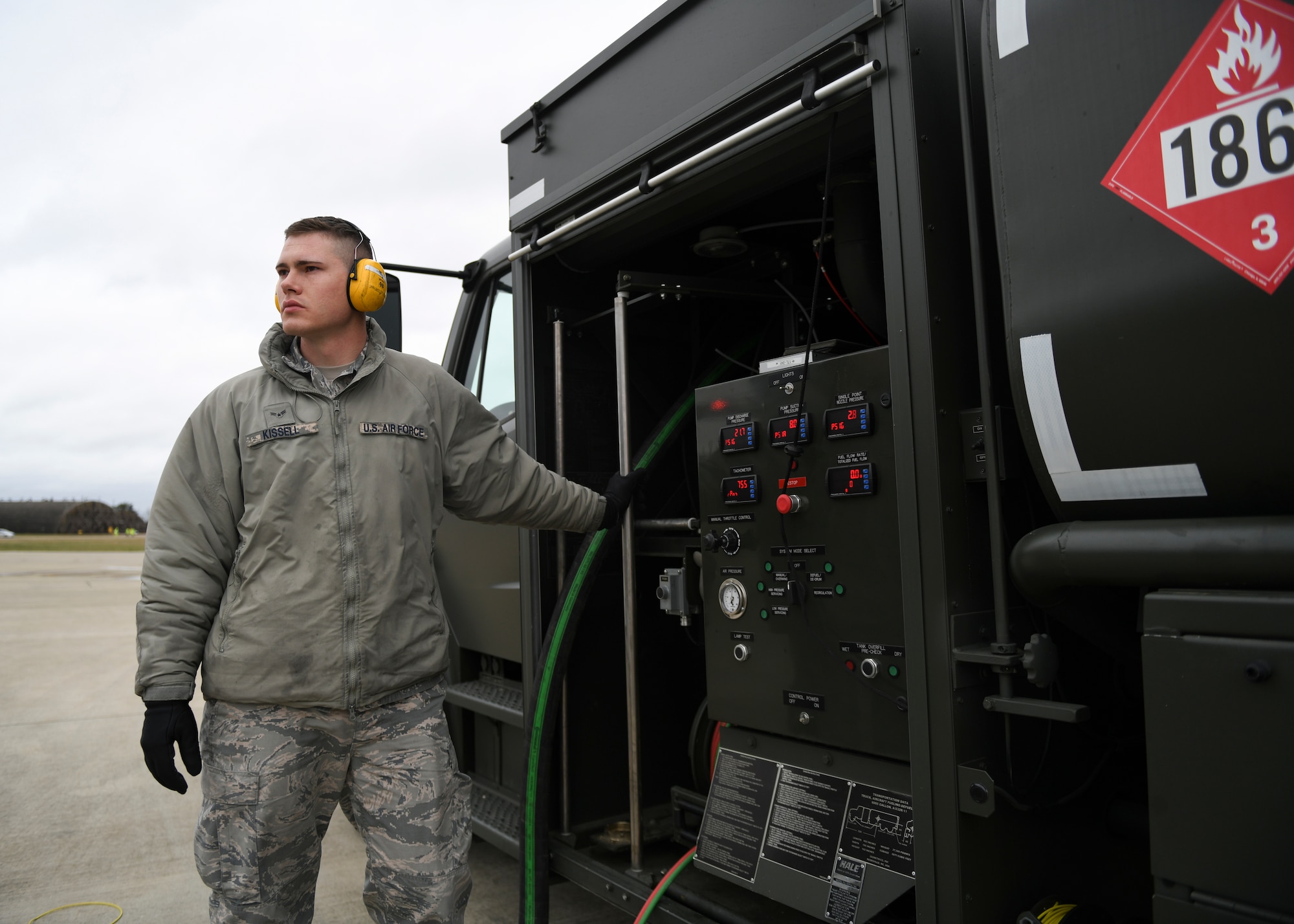 Airman 1st Class Nicholas Kissell, 48th Logistics Readiness Squadron Fuels Distribution operator, controls the flow of fuel from an Isometric R-11 Refueling Truck at Royal Air Force Lakenheath, England, March 12, 2019. The 48th Fighter Wing is the first to use these trucks operationally in the Air Force after the vehicles were introduced into testing in May 2016. (U.S. Air Force photo by Senior Airman Malcolm Mayfield)