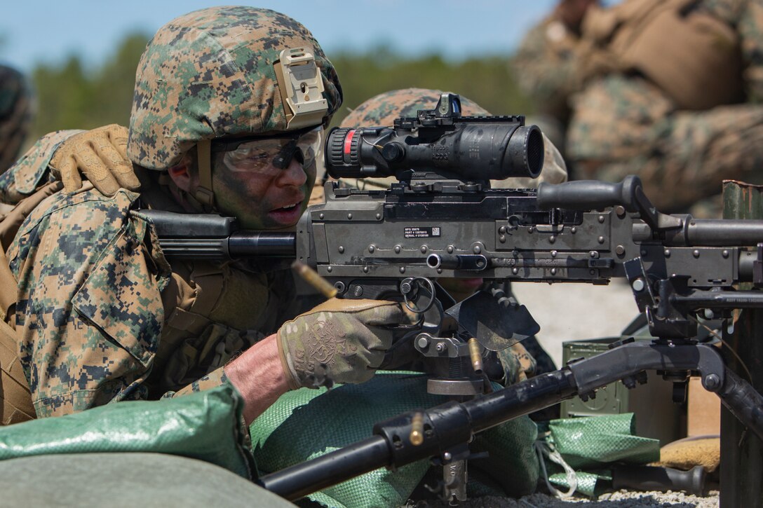 A U.S. Marine with 2nd Combat Engineer Battalion, 2nd Marine Division, fires an M240 Bravo Machine Gun during 2nd CEB Field Exercise 2 on Camp Lejeune, N.C., March 28, 2019. This exercise gives Marines realistic training opportunities to increase individual knowledge and maintain combat effectiveness. (U.S. Marine Corps photo by Lance Cpl. Nathaniel Q. Hamilton)