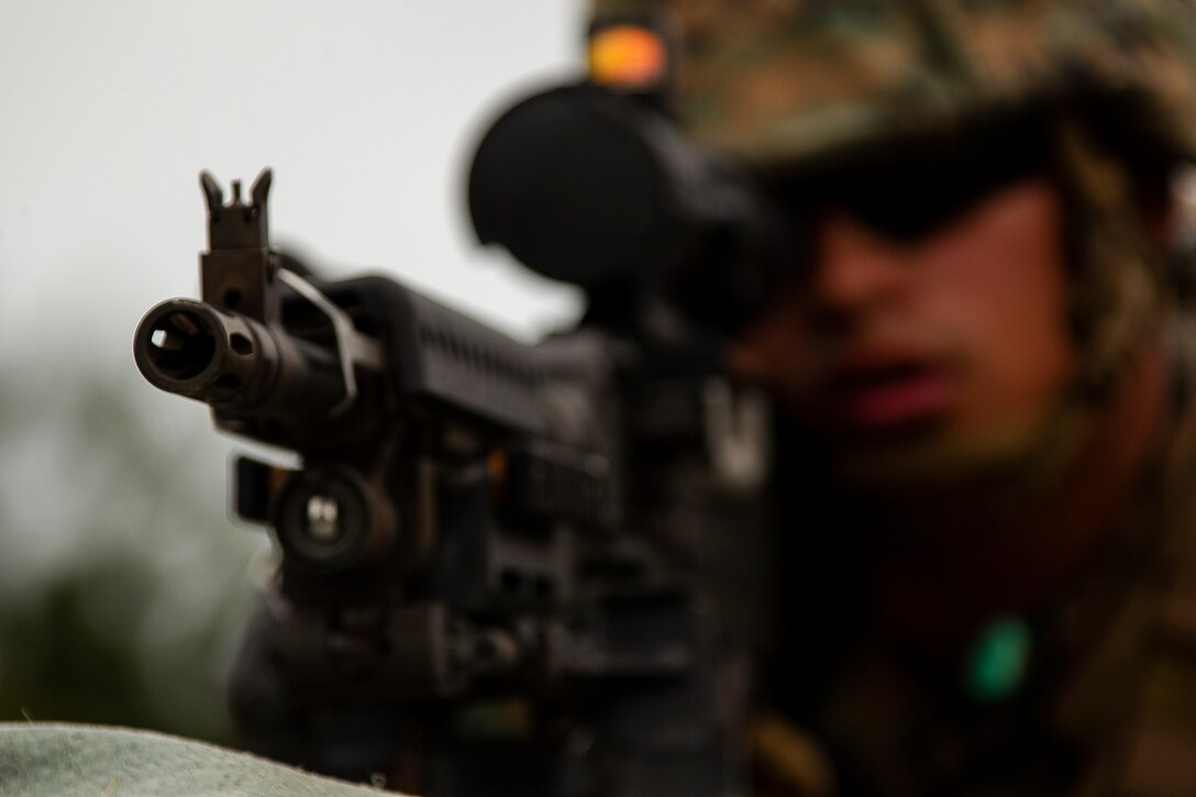 Lance Cpl. Samuel Flores, a heavy equipment operator with Combat Logistics Battalion 31, mans a firing position during machine gun training at Camp Hansen, Okinawa, Japan, March 29, 2019. Flores, a native of Miami, graduated from Miami Coral Park High School in September 2016 before enlisting in January the following year. CLB-31 is the Logistics Combat Element for the 31st Marine Expeditionary Unit. The 31st MEU, the Marine Corps' only continuously forward-deployed MEU partnering with the U.S. Navy's Amphibious Squadron 11, provides a flexible and lethal force ready to perform a wide range of military operations as the premier crisis response force in the Indo-Pacific region.