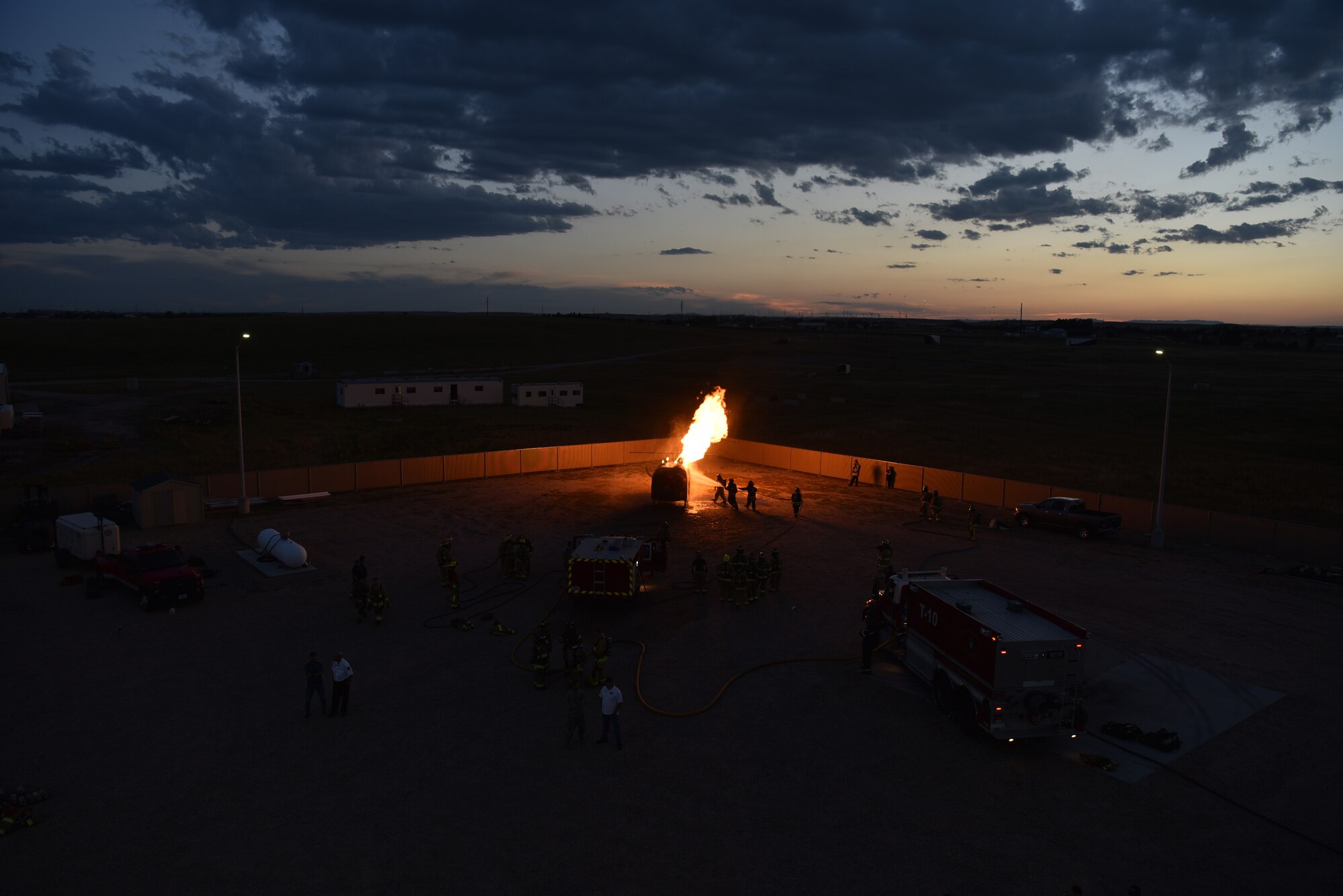 Francis E. Warren Air Force Base Fire and Emergency Services train with fire departments from all around Wyoming and northern Colorado, Aug. 29, 2018. F.E. Warren Fire & Emergency Service is one of approximately 250 agencies, and the only agency in Air Force Global Strike Command and the state of Wyoming to achieve Internationally Accredited Agency status. (U.S. Air Force photo by Airman 1st Class Braydon Williams)