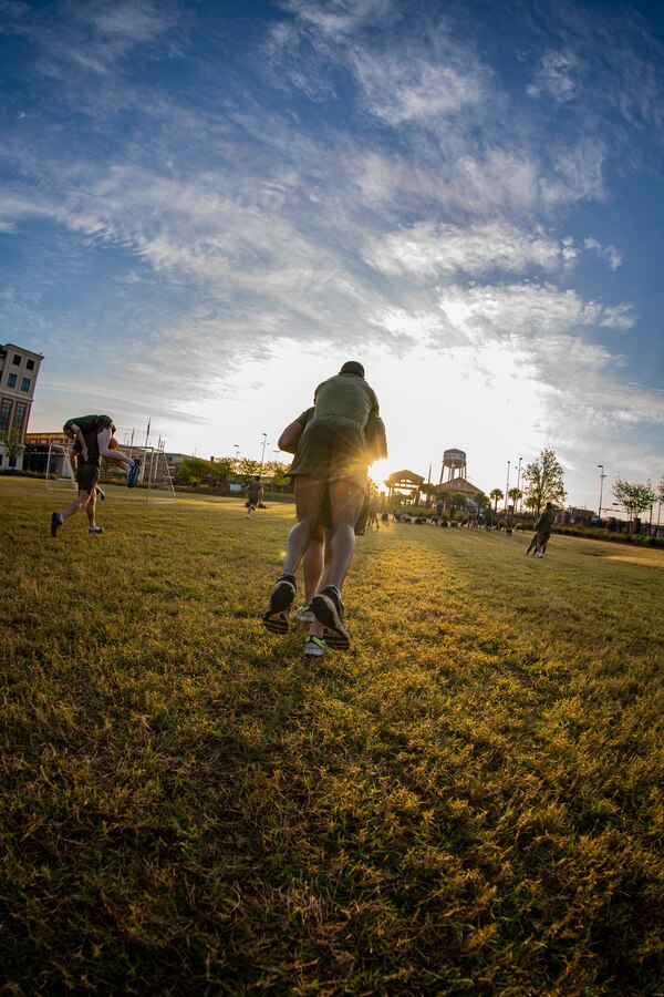 Marines with Marine Forces Reserve participate in a Total Force Fitness event at Marine Corps Support Facility New Orleans, March 29, 2019. The MARFORRES Marines conducted various physical activities, such as tug-of-war, buddy carries, high-intensity suicide drills, medicine ball exercises and the dissemble and assembly of a M4 Service Carbine. The event promoted physical fitness, unit cohesion and esprit de corps. (U.S. Marine Corps photo by Sgt. Andy O. Martinez)