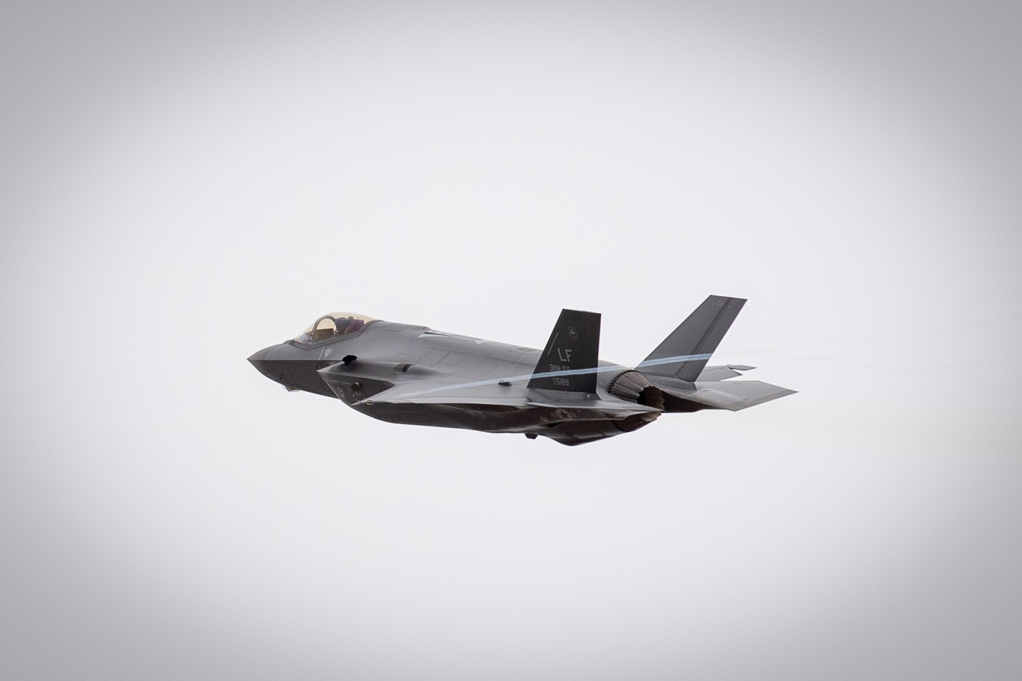 An F-35A Lighting II, assigned to the 62d Fighter Squadron, completes a pass near the control tower, March 27, 2019 at the Barry M. Goldwater Range near Gila Bend, Ariz.