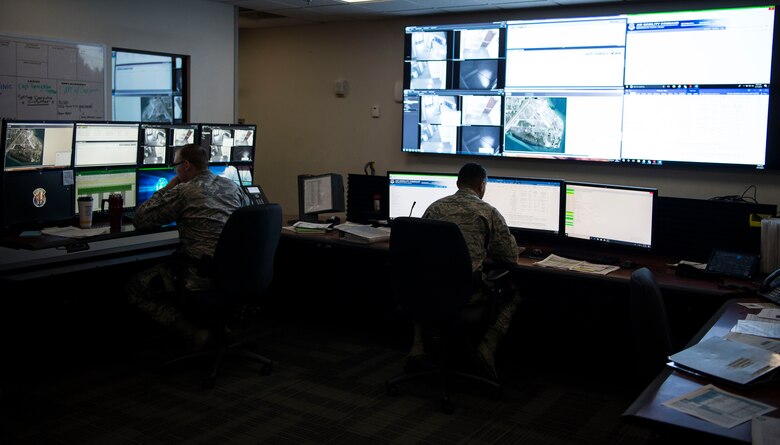 6th Security Forces Squadron Airmen monitor base security with new equipment inside the base defense operations center at MacDill Air Force Base, Fla., March 11, 2019.