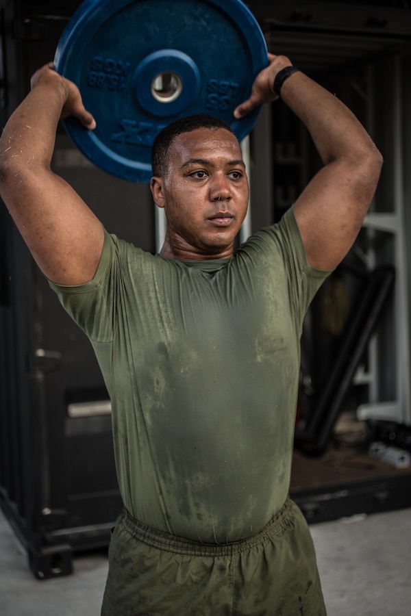 Cpl. Lawrence S. Betts, admin clerk with Installation Personnel Administration Center, Marine Forces Reserve, participates in high intensity tactical training during a Total Force Fitness event at Marine Corps Support Facility New Orleans, March 29, 2019. HITT lockers are portable containers that include workout necessities like dumbbells, plates, kettlebells, ropes and pullup bars to keep Marines physically fit regardless of their location. (U.S. Marine Corps photo by Sgt. Dante J. Fries)