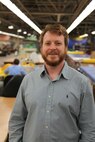 Norfolk Naval Shipyard's Shop 89’s Zone Manager David
Kinnaird takes a break for a photo at Bldg. 369, sail loft.