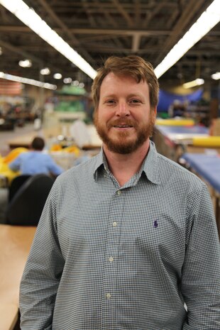 Norfolk Naval Shipyard's Shop 89’s Zone Manager David
Kinnaird takes a break for a photo at Bldg. 369, sail loft.