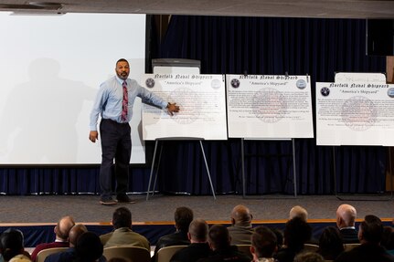 Norfolk Naval Shipyard's (NNSY) Brian Darden, Code 105.1 Deputy Director, Radiological Controls-Support Operations addresses new NNSY Force Multipliers during the March 4.