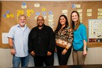 FROM LEFT TO RIGHT: Norfolk Naval Shipyard's Kelly Carson, Code 100PI Engineering Technician; Khiari Tyler, Code 100PI Master Black Belt Instructor and NAVSEA Lean Six Sigma College Branch Head; Clara Cuervo, Code 100PI Industrial Engineer; Megan Hanni, Code 100PI Engineering Technician.