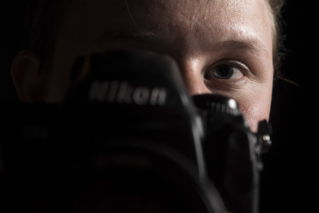 Airman 1st Class Aubree Milks, 30th Space Wing Public Affairs photojournalist, prepares to take a photo April 2, 2019, at Vandenberg Air Force Base, Calif. Milks documents Vandenberg AFB's rocket launches and other missions across base. (U.S. Air Force photo by Airman 1st Class Hanah Abercrombie)