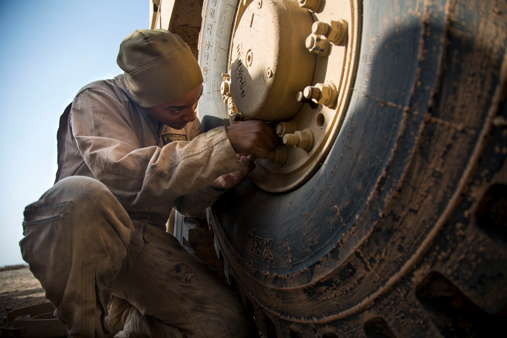 U.S. Marine Corp Sgt. Naomi L. Polumbo, a motor transport mechanic with Combat Logistics Detachment 34, attached to Special Purpose Marine Air Ground Task Force Crisis Response-Central Command, checks a seal for leakage on a mine-resistant, ambush-protected vehicle in Southwest Asia Jan. 26, 2019. As a quick reaction force, the SPMAGTF-CR-CC is capable of deploying aviation, ground and logistical forces forward at a moment’s notice.