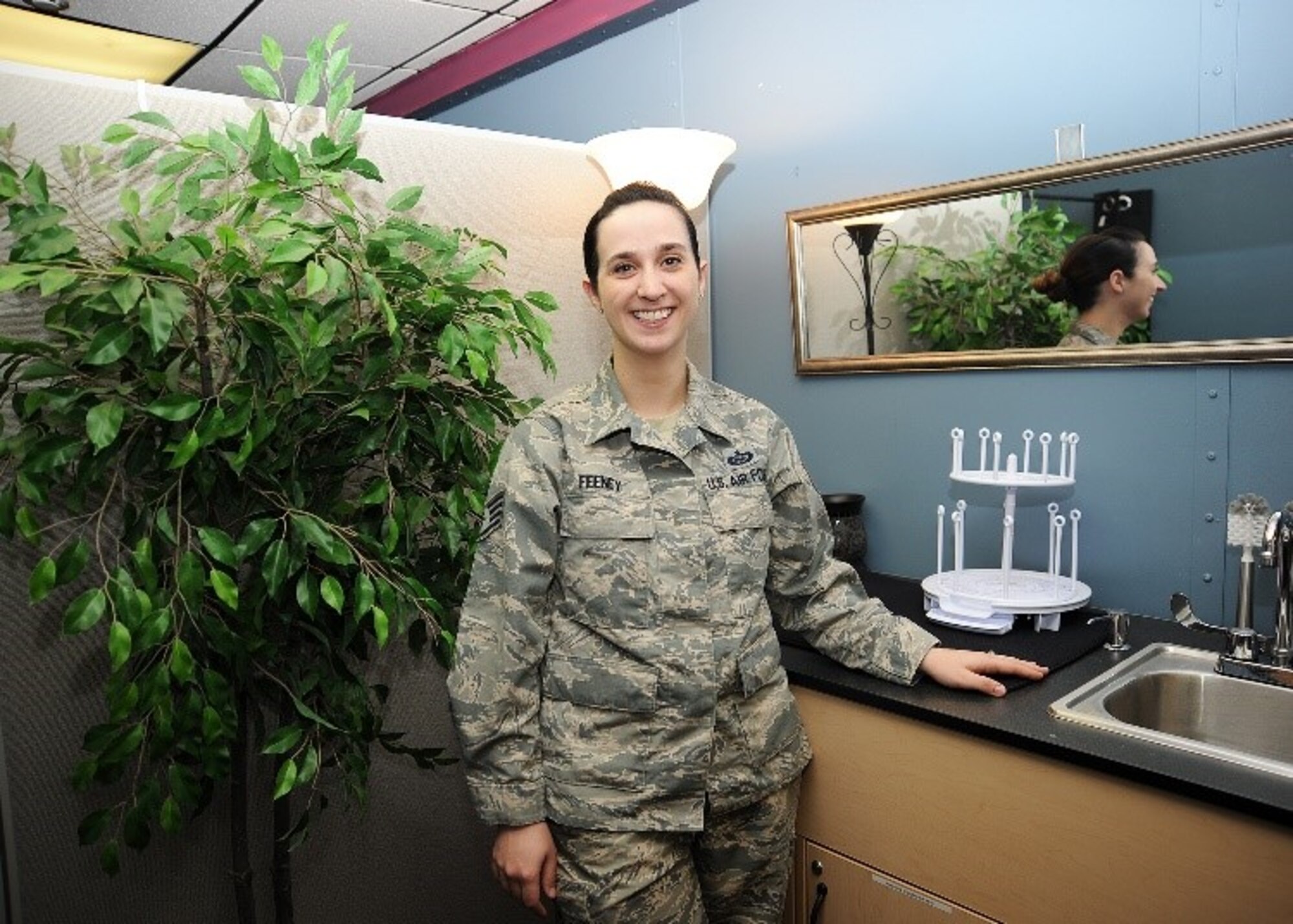 Staff Sgt. Trisha Feeney, 20th Intelligence Squadron, poses for photo March 12, 2019 in the squadron’s new lactation room on Offutt Air Force Base, Nebraska. Feeney established and designed the room to give lactating mom’s privacy as they pump breastmilk for their babies. (U.S. Air Force courtesy photo)