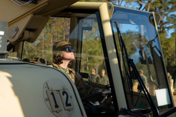 U.S. Marine Lance Cpl. Kaytlin Deschanes with Ammunition Company, 2nd Supply Battalion, Combat Logistics Group 25, 2nd Marine Logistics Group operates a light capability rough terrain forklift to load ammunition onto a medium tactical vehicle replacement on Camp Lejeune, N.C., March 27. 2019. Ammo Co. constructed a Field Ammunition Supply Point in support of 2nd Marine Division to supply everything from 5.56 millimeter small arms to high explosive ordnance. (U.S. Marine Corps photo by Lance Cpl. Damion Hatch Jr.)