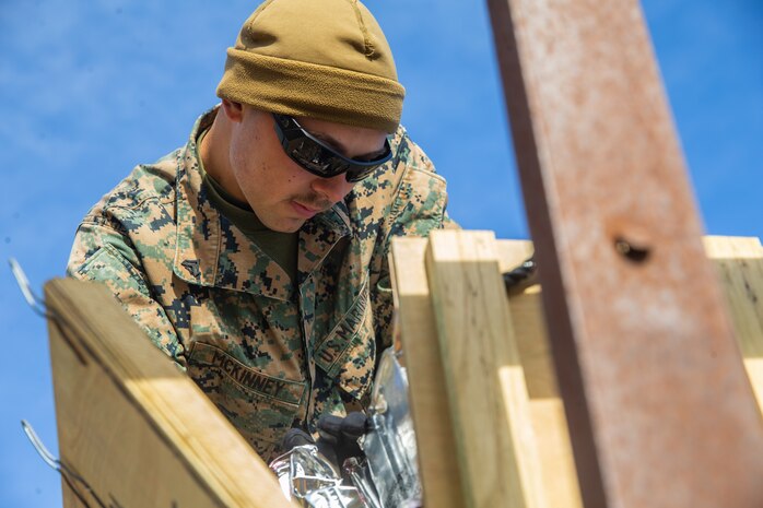 U.S. Marine Cpl. Noah Mckinney with Ammunition Company, 2nd Supply Battalion, Combat Logistics Group 25, 2nd Marine Logistics Group counts left over ammunition on Camp Lejeune, N.C., March 27. 2019. Ammo Co. constructed a Field Ammunition Supply Point in support of 2nd Marine Division to supply everything from 5.56 millimeter small arms to high explosive ordnance. (U.S. Marine Corps photo by Lance Cpl. Damion Hatch Jr.)