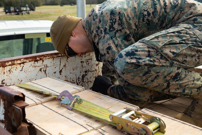 Marine Cpl. Noah Mckinney with Ammunition Company, 2nd Supply Battalion, Combat Logistics Group 25, 2nd Marine Logistics Group counts left over ammunition on Camp Lejeune, N.C., March 27. 2019. Ammo Co. constructed a Field Ammunition Supply Point in support of 2nd Marine Division to supply everything from 5.56 millimeter small arms to high explosive ordnance. (U.S. Marine Corps photo by Lance Cpl. Damion Hatch Jr.)
