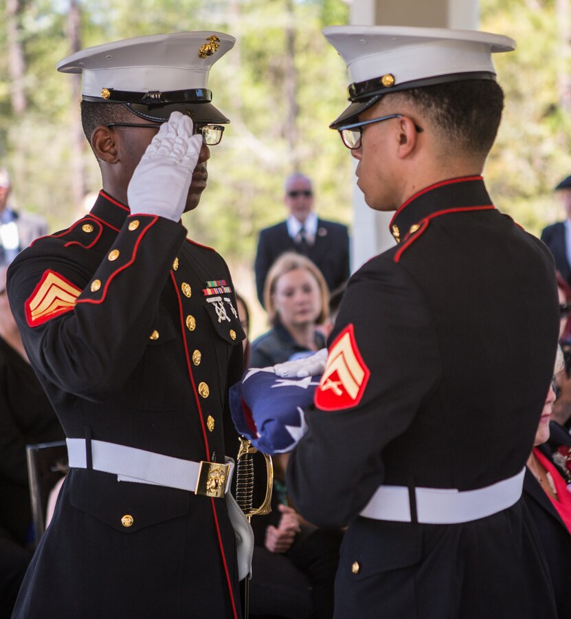 Marines with Marine Forces Reserve prepare a flag for presentation to the next of kin during retired Lt. Col. Dennis Stegall’s funeral ceremony at Southeast Louisiana Veterans Cemetery on April 1, 2019. Stegall retired from the Marine Corps after 23 years of service in 2006 and continued to serve as the Marine Corps deputy comptroller for MARFORRES. (U.S. Marine Corps photo by Sgt. Dante J. Fries)