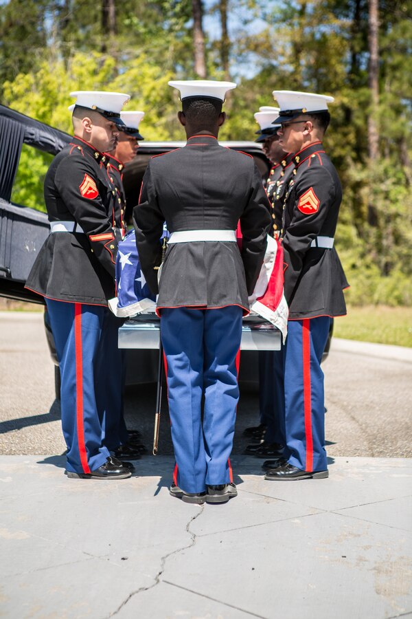 Marines with Marine Forces Reserve conduct military funeral honors for retired Lt. Col. Dennis Stegall at Southeast Louisiana Veterans Cemetery on April 1, 2019. Stegall retired from the Marine Corps after 23 years of service in 2006 and continued to serve as the Marine Corps deputy comptroller for MARFORRES. (U.S. Marine Corps photo by Sgt. Dante J. Fries)