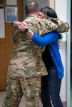Rita Ibanez hugs Air Force Maj. (Dr.) Matthew Read, acting Extracorporeal Membrane Oxygenation medical director, at Brooke Army Medical Center, Joint Base San Antonio-Fort Sam Houston, March 22. Ibanez met with Read and other members of the ECMO team to thank them for the care she received in 2015.