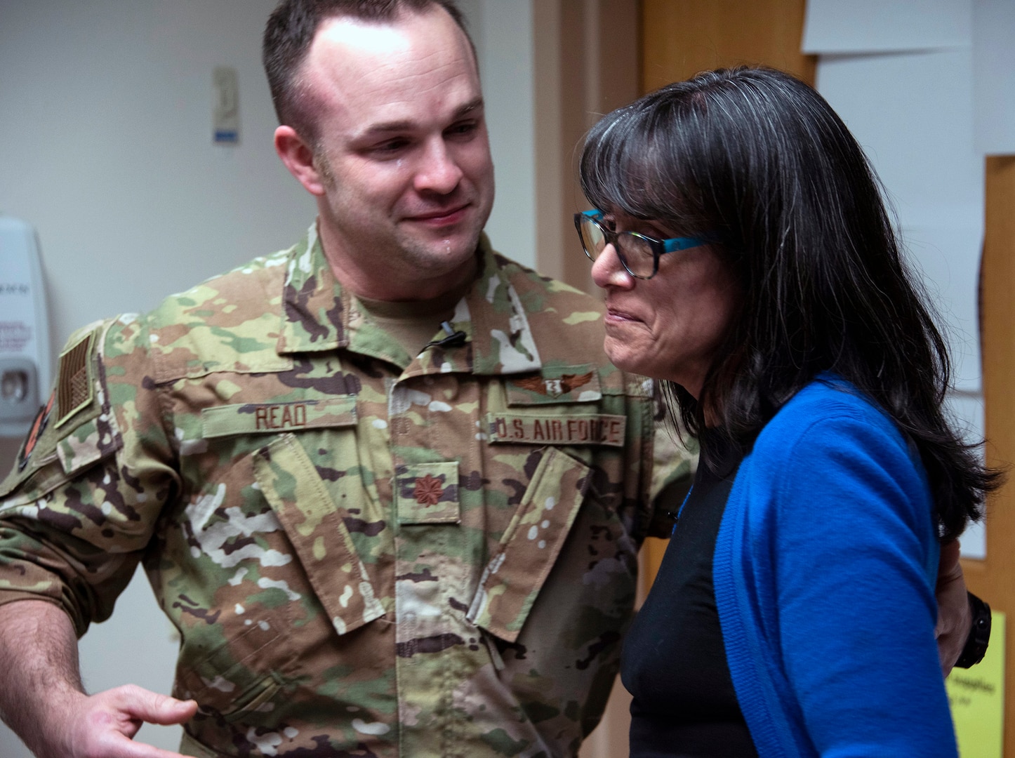 Air Force Maj. (Dr.) Matthew Read, acting Extracorporeal Membrane Oxygenation medical director, shares an emotional moment with former patient, Rita Ibanez, at Brooke Army Medical Center, Joint Base San Antonio-Fort Sam Houston, March 22. Ibanez met with Read and other members of the ECMO team to thank them for the care she received in 2015.