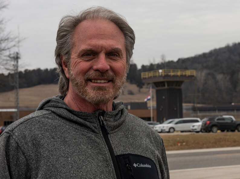Danny Cox, a pastor at a local church in O’Fallon, Illinois, said he was motivated to start his prison ministry program after serving 10 years for a drug sales offense. He’s pictured here outside of the Missouri Eastern Correctional in Pacific, Missouri. On his visits to five different prisons in Illinois and Missouri, Cox also mentors aspiring minister Tech. Sgt. Sydney Sullivan, 375th Communications Squadron NCO in charge of the Mission Defense Team. (U.S. Air Force photo by Senior Airman Tara Stetler)