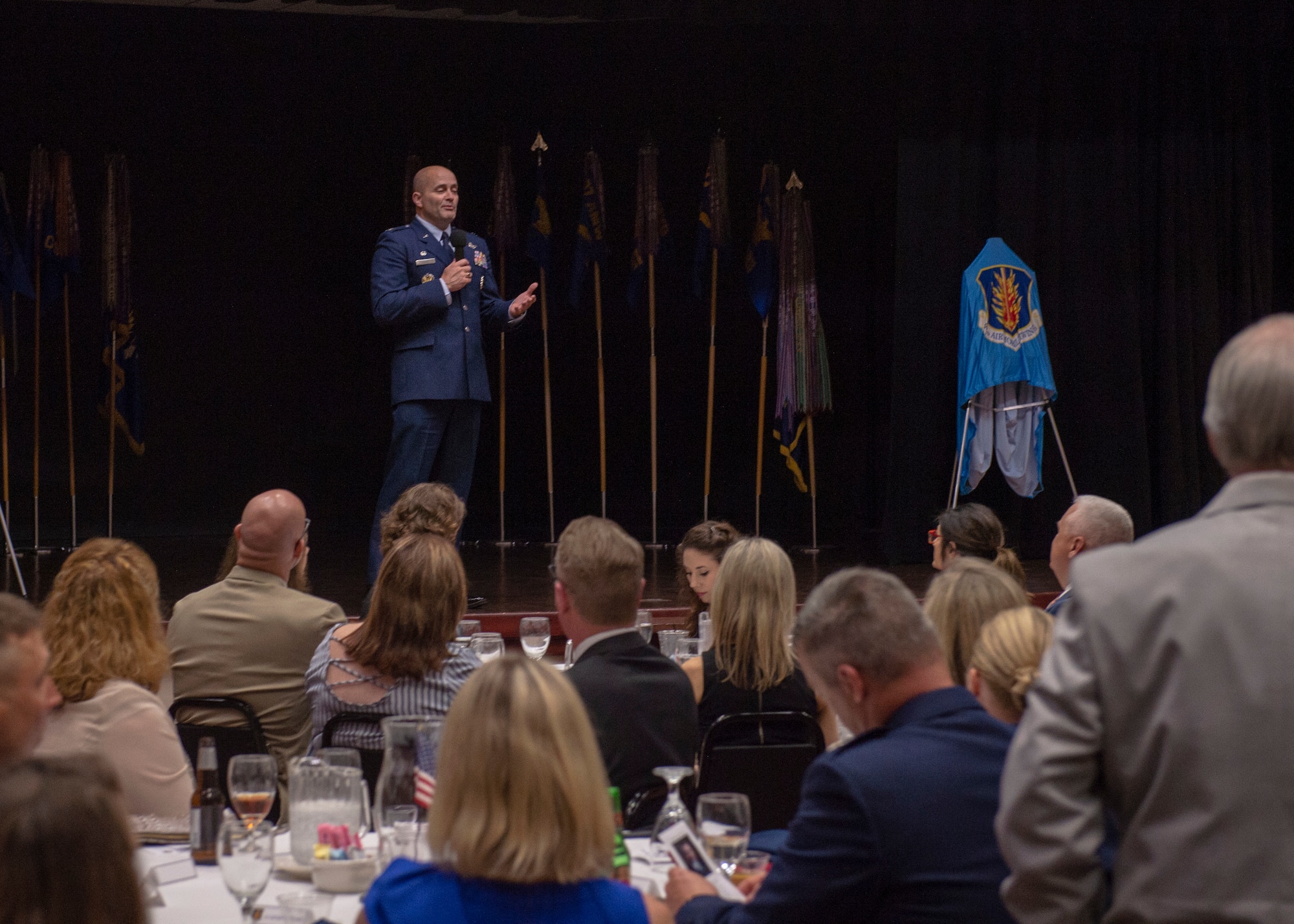 U.S. Air Force Col. Eric Carney, 97th Air Mobility Wing commander, speaks about the reasons he selected the new Friends of Altus, March 29, 2019, at Altus Air Force Base, Okla. Carney awarded two new friends who were very to the base, its mission and its Airmen.  (U.S. Air Force Photo by Senior Airman Jackson N. Haddon)