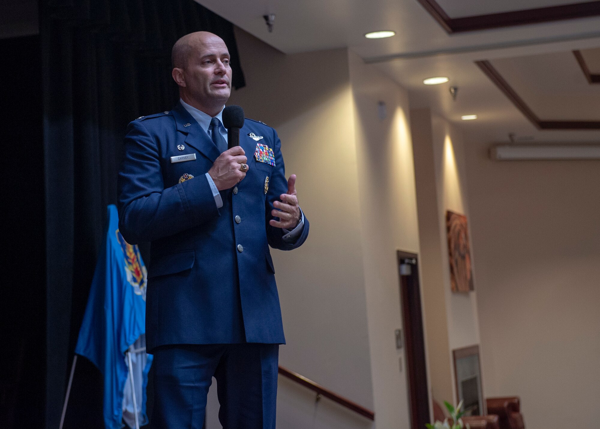 U.S. Air Force Col. Eric Carney, 97th Air Mobility Wing commander, speaks about the Honorary Commanders Program at the 97th AMW and what his goals are for it, March 29, 2019, at Altus Air Force Base, Okla. Carney expressed the importance of the relationship and how both the base and the community can aid, support and further each other in future operations. (U.S. Air Force Photo by Senior Airman Jackson N. Haddon)