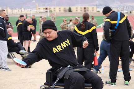 Spc. Kevin Holyan launches a few practice seated discus throws prior to the field event March 11, during the Army Trials at Fort Bliss, Texas. The 2019 Army Trials is an adaptive sports competition with more than 100 wounded, ill and injured active-duty Soldiers and veterans competing in 14 different sports for the opportunity to represent Team Army at the 2019 Department of Defense Warrior Games in Tampa, Florida.