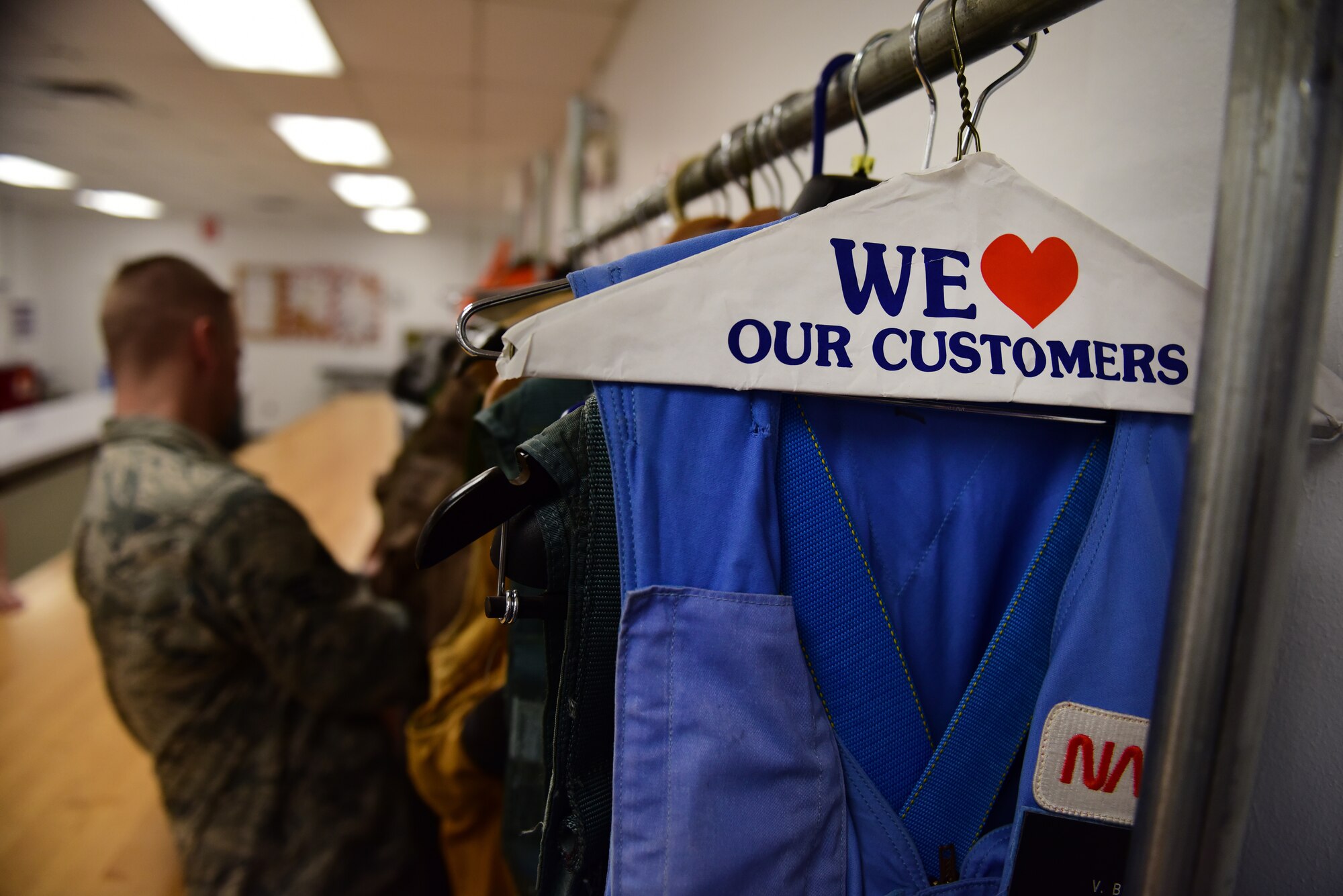 Staff Sgt. Jake Strait, 47th Operations Support Squadron aircrew flight equipment parachute technician, admires NASA's collection of aircraft harnesses at Ellington Airport, Texas, March 26, 2019. Strait visited NASA's Aircraft Operations T-38 life support to assist in the newly revamped T-38 parachute packing procedures. (U.S. Air Force photo by Senior Airman Benjamin N. Valmoja)