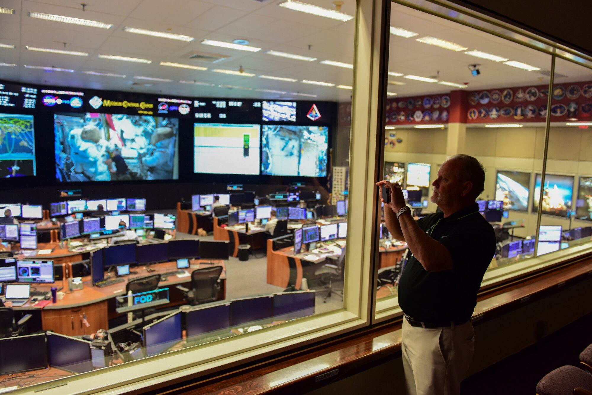 Tommy Sondag, 47th Operations Support Squadron aircrew flight equipment parachute technician, takes some photos for the road, at Johnson Space Center, Texas, March 26, 2019. Sondag visited NASA's Aircraft Operations T-38 life support to assist in the newly revamped T-38 parachute packing procedures. During his visit, he was given a tour of the NASA facilities in the area. (U.S. Air Force photo by Senior Airman Benjamin N. Valmoja)