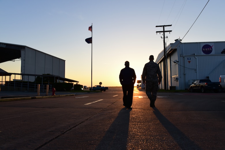 Tommy Sondag and Staff Sgt. Jake Strait, 47th OSS aircrew flight equipment parachute technicians, get ready to start their day at Ellington Airport, Texas, March 27, 2019. Sondag and Strait visited NASA's Aircraft Operations T-38 life support to assist in the newly revamped T-38 parachute packing procedures. During his visit, he was given a tour of the NASA facilities in the area. (U.S. Air Force photo by Senior Airman Benjamin N. Valmoja)