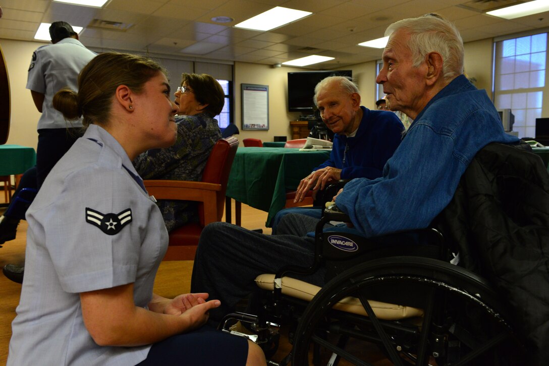 A1C Aliyah Richling talks with veterans at the Sioux Falls, South Dakota VA hospital after a performance