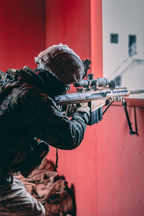 A U.S. Marine with 1st Battalion, 7th Marine Regiment, 1st Marine Division, fires a Barrett 82A1 sniper rifle during Integrated Training Exercise (ITX) 2-19 at Range 220 on Marine Corps Air Ground Combat Center, Twentynine Palms, Calif., Feb. 9, 2019. The purpose of ITX is to create a challenging, realistic training environment that produces combat-ready forces capable of operating as an integrated Marine Air Ground Task Force. (U.S. Marine Corps photo by Lance Cpl. Colton Brownlee)