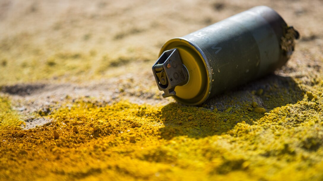 A M18 smoke grenade sits on the ground during Integrated Training Exercise (ITX) 2-19 at Range 220 on Marine Corps Air Ground Combat Center, Twentynine Palms, Calif., Feb. 9, 2019. The purpose of ITX is to create a challenging, realistic training environment that produces combat-ready forces capable of operating as an integrated Marine Air Ground Task Force. (U.S. Marine Corps photo by Lance Cpl. Colton Brownlee)