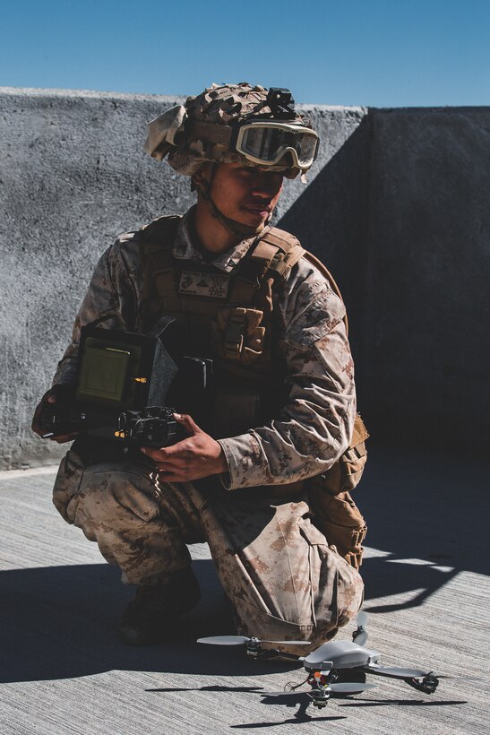 U.S. Marine Corps Lance Cpl. Nicholas Nguyen with 1st Battalion, 7th Marine Regiment, 1st Marine Division, flies a small unmanned aerial system Integrated Training Exercise (ITX) 2-19 at Range 220 on Marine Corps Air Ground Combat Center, Twentynine Palms, Calif., Feb. 9, 2019. The purpose of ITX is to create a challenging, realistic training environment that produces combat-ready forces capable of operating as an integrated Marine Air Ground Task Force. (U.S. Marine Corps photo by Lance Cpl. Corey Mathews)