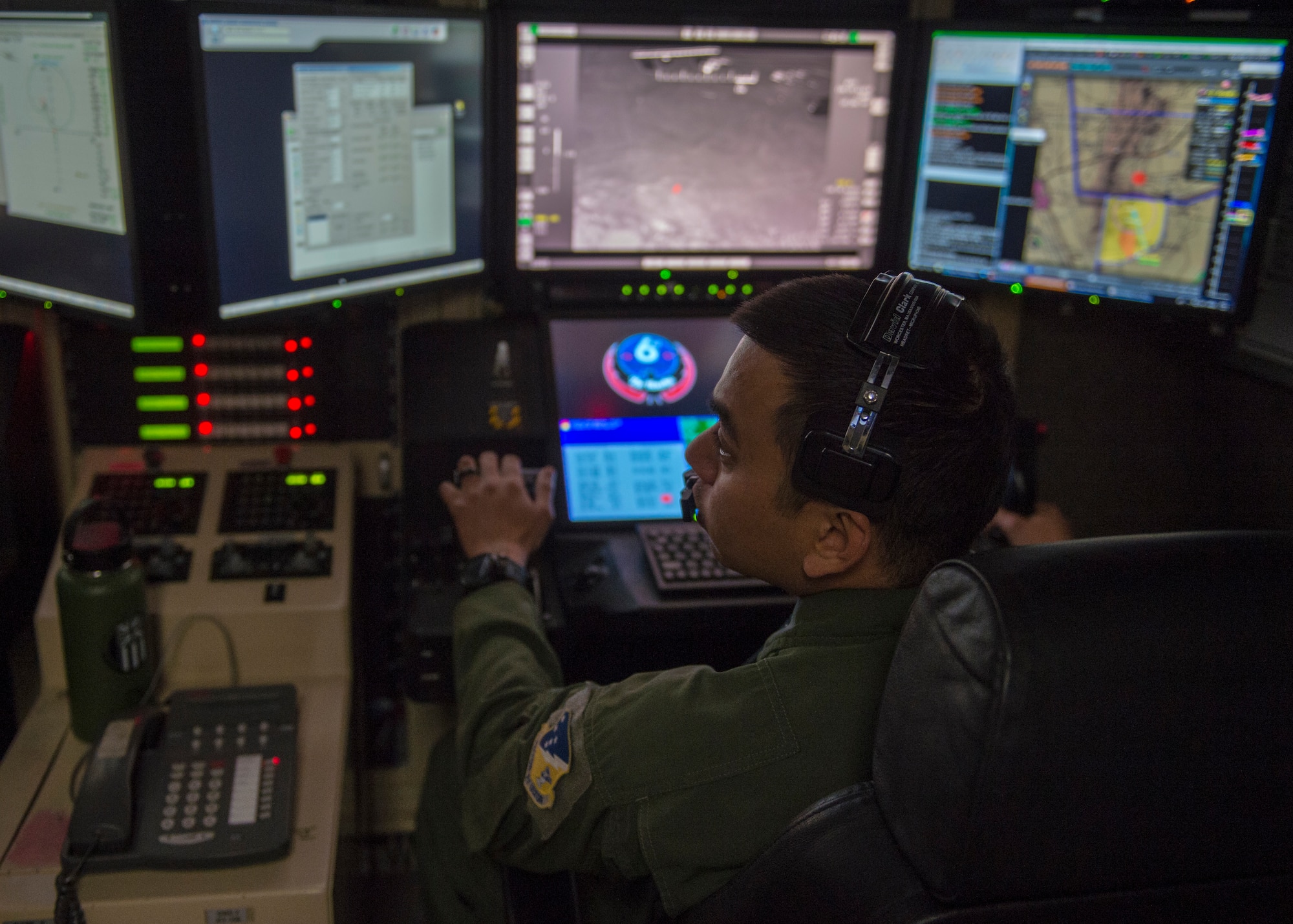 Tech. Sgt. Joaquin, 6th Attack Squadron MQ-9 Reaper sensor operator instructor, coordinates with the pilot during an exercise over Red Rio Range, N.M., March 14, 2019, at the 6th Attack Squadron on Holloman Air Force Base, N.M. Intelligence, surveillance, reconnaissance, close air support and combat search and rescue are only a few of the missions and tasks the MQ-9 can perform. (U.S. Air Force photo by Airman 1st Class Kindra Stewart)